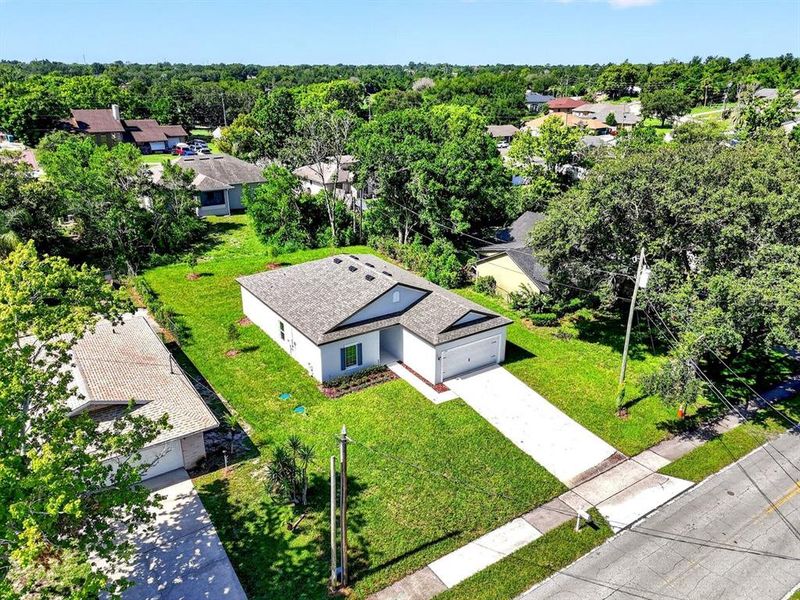 Front exterior of a new home in , Deltona, FL, highlighting curb appeal (Image 23).