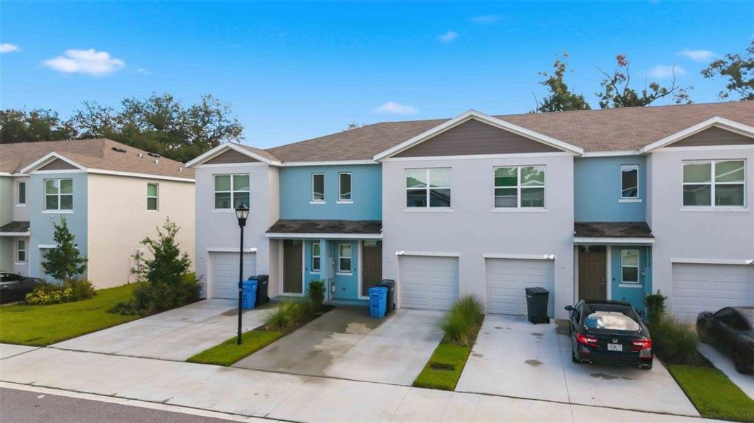 Front exterior of a new home in , Tampa, FL, highlighting curb appeal (Image 22).
