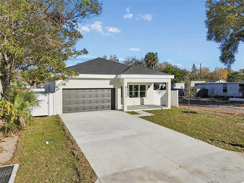 Front exterior of a new home in , St. Petersburg, FL, highlighting curb appeal (Image 2). Front exterior of a new home in , St. Petersburg, FL, highlighting curb appeal (Image 2).