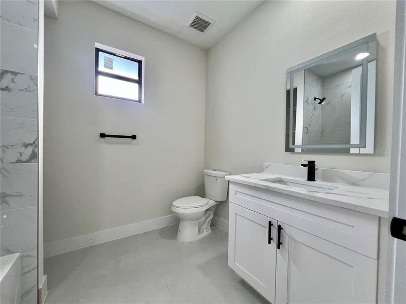 Furnished interior view inside a new home in , Port Charlotte (Image 17).