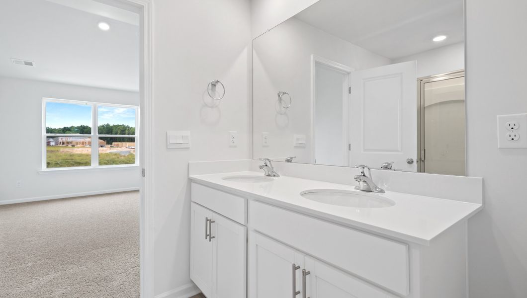 Representative furnished interior of a home built from the BRANDON by D.R. Horton in Harrier Point, Woodruff (Image 11).