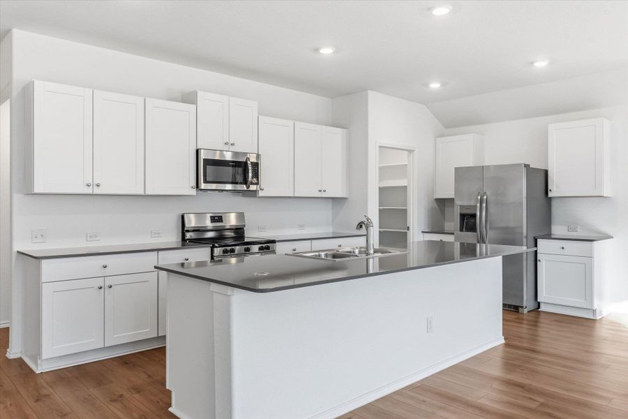 Furnished interior view inside a new home in Thunder Rock: Watermill Collection, Marble Falls (Image 6).