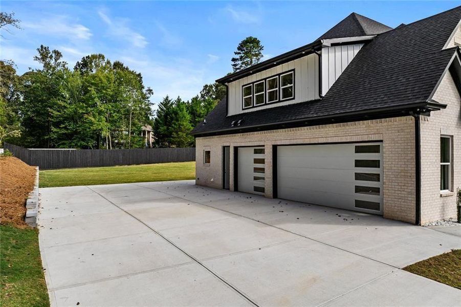 Front exterior of a new home in , Loganville, GA, highlighting curb appeal (Image 33).