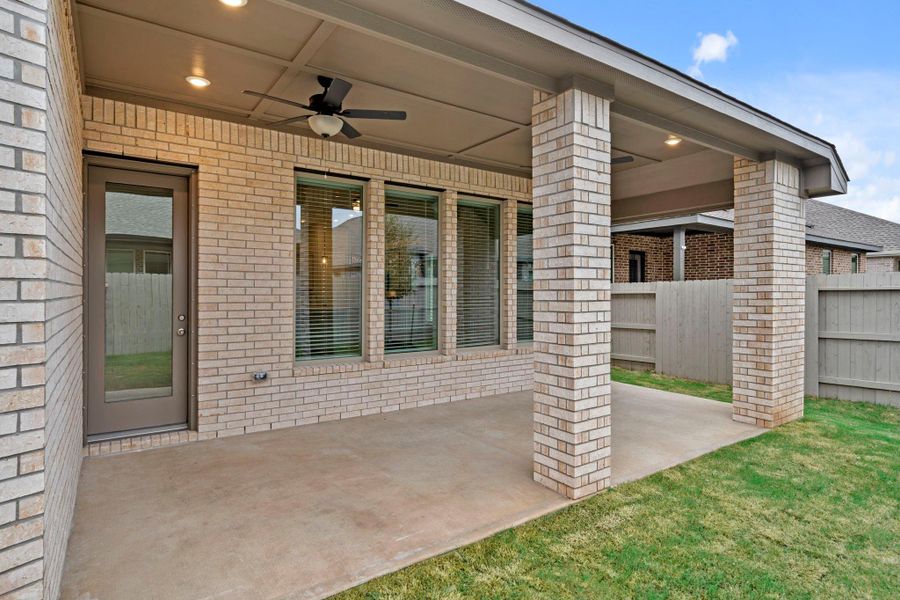 Exterior details and patio area of a home in Pomona 50' & 55', Manvel (Image 3).