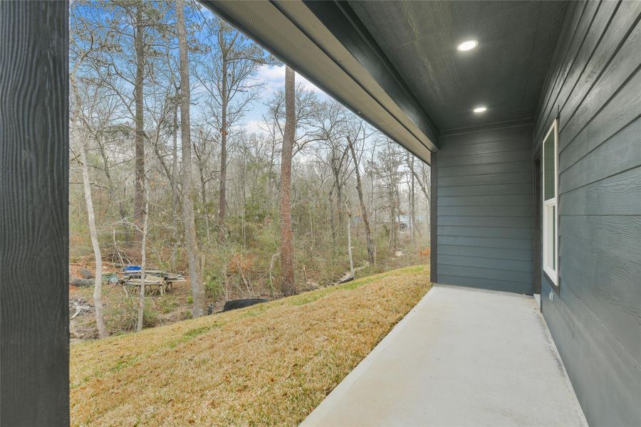 Exterior details and patio area of a home in , Willis (Image 26).