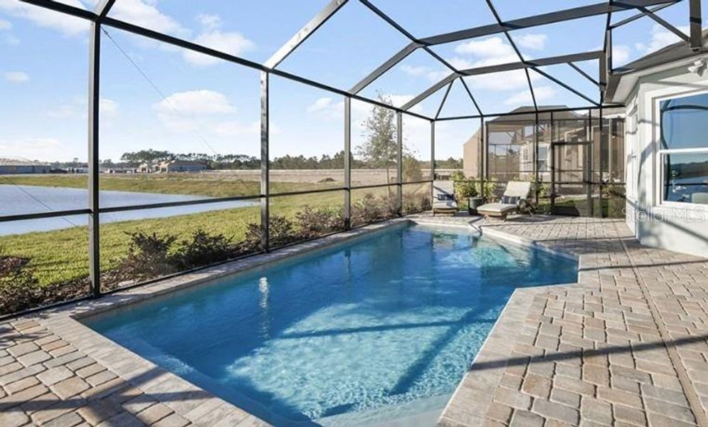 Exterior details and patio area of a home in Center Lake Ranch Community Group Page, St. Cloud (Image 3).