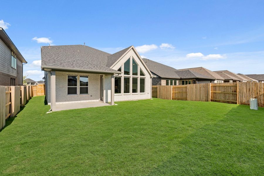 Exterior details and patio area of a home in Elyson 45' & 70', Katy (Image 2).