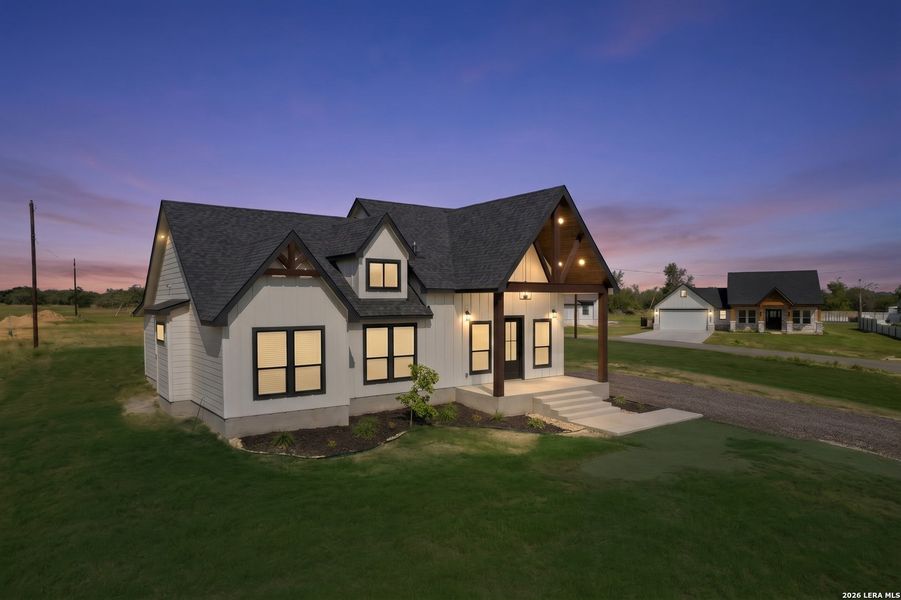 Front exterior of a new home in , Atascosa, TX, highlighting curb appeal (Image 23).