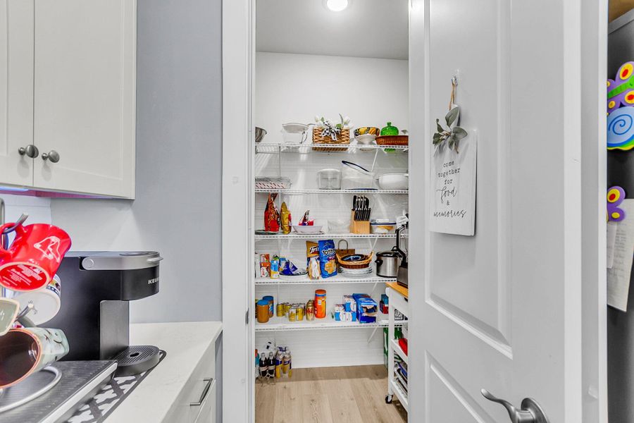 Furnished interior view inside a new home in K. Hovnanian's® Four Seasons at Lakes of Cane Bay, Summerville (Image 32).