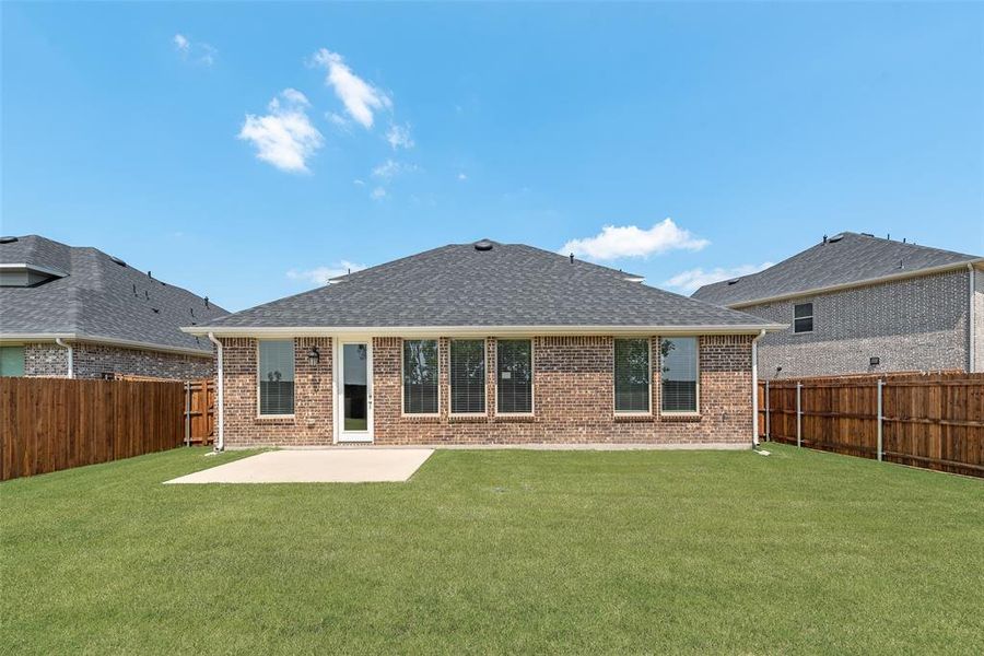 Front exterior of a new home in Walden Pond, Forney, TX, highlighting curb appeal (Image 20). Front exterior of a new home in Walden Pond, Forney, TX, highlighting curb appeal (Image 20).