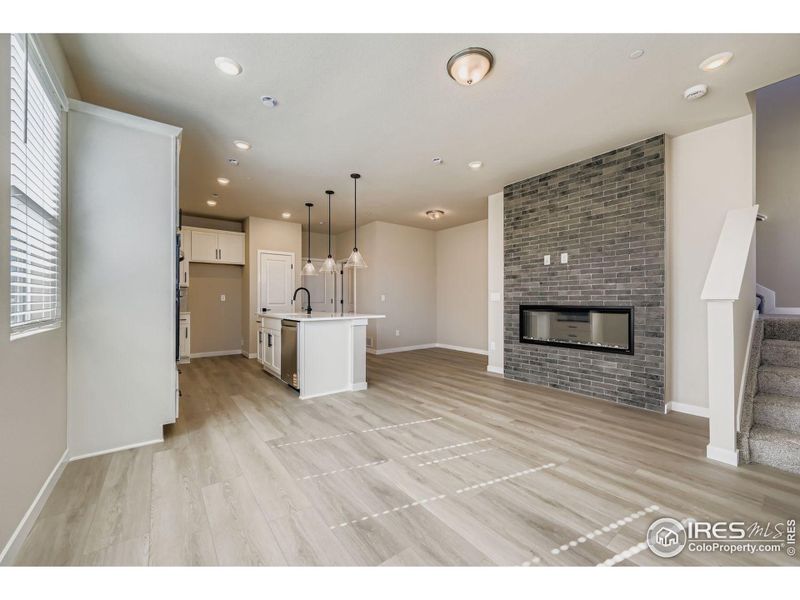 Floor to ceiling title surrounding the fireplace