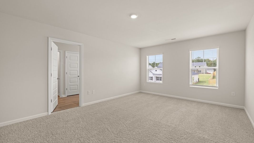 Spacious, unfurnished interior of a new home in Preserve at Dove Creek, Statham (Image 19).