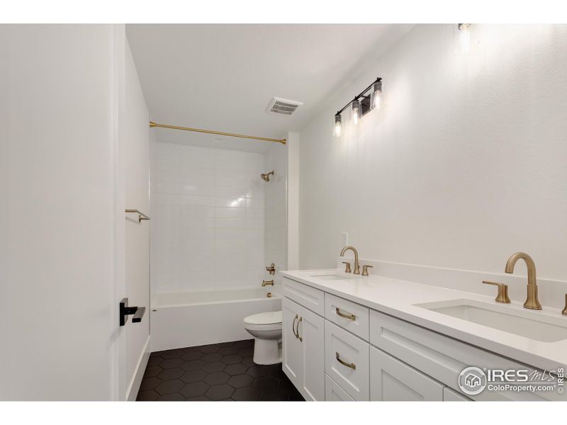 Secondary Bathroom with Dual Sinks Secondary Bathroom with Dual Sinks