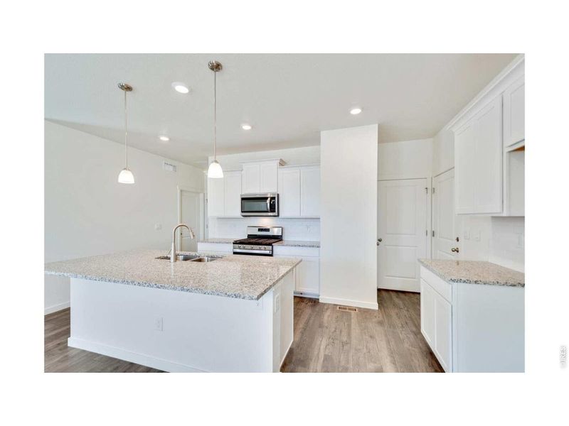 Furnished interior view inside a new home in Prairie Song, Windsor (Image 6).
