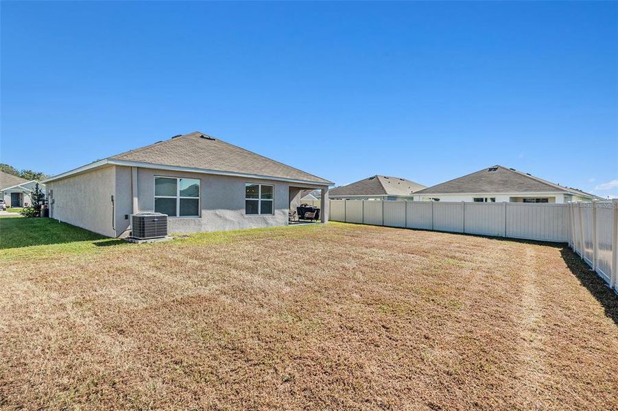 Exterior details and patio area of a home in Bella Lago, Parrish (Image 23).