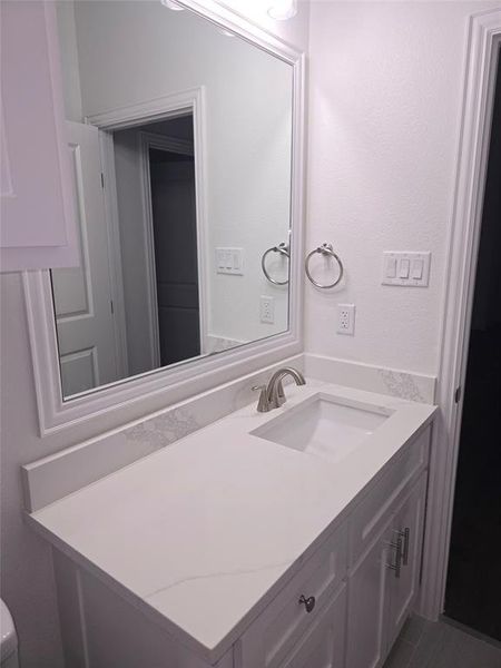 Bathroom featuring vanity Bathroom featuring vanity