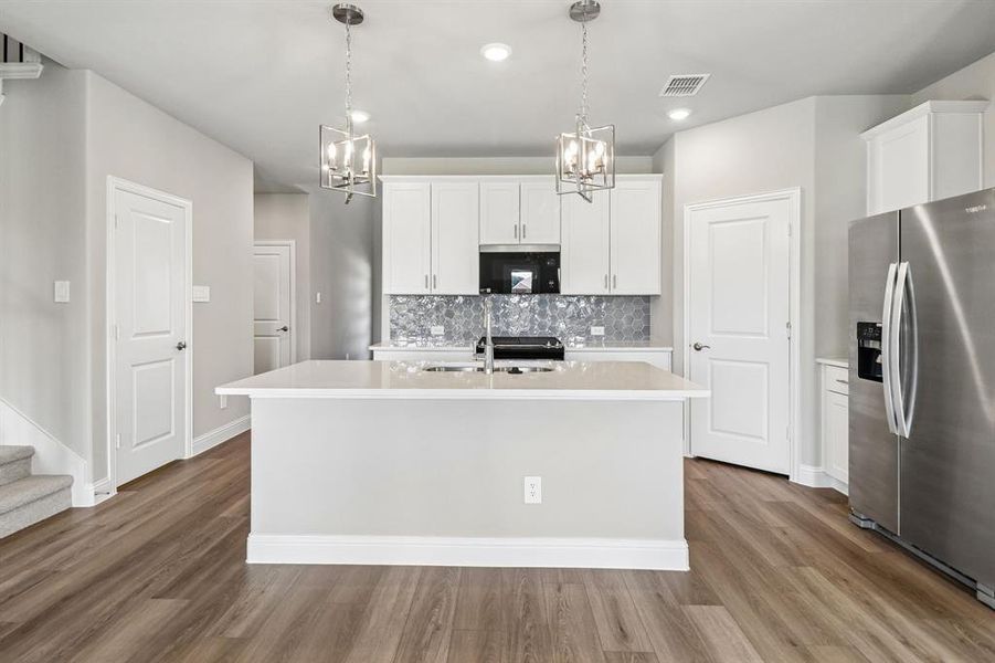 Furnished interior view inside a new home in Eastridge - Signature Series, Princeton (Image 8). Furnished interior view inside a new home in Eastridge - Signature Series, Princeton (Image 8).