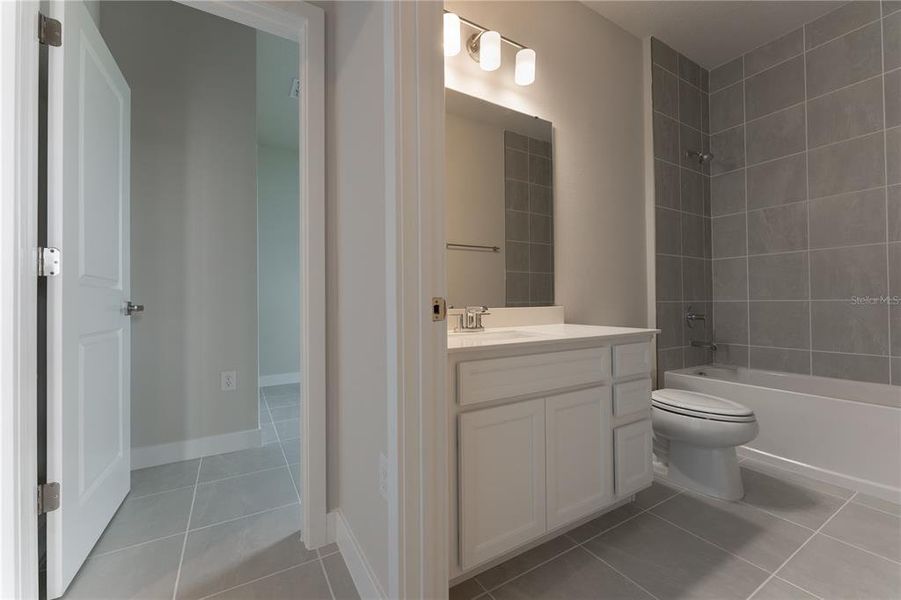 Furnished interior view inside a new home in The Palms at Venetian Bay, New Smyrna Beach (Image 2).