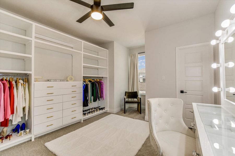 This bedroom is used for the owners Beauty Room, custom cabinets and lots of natural lighting.