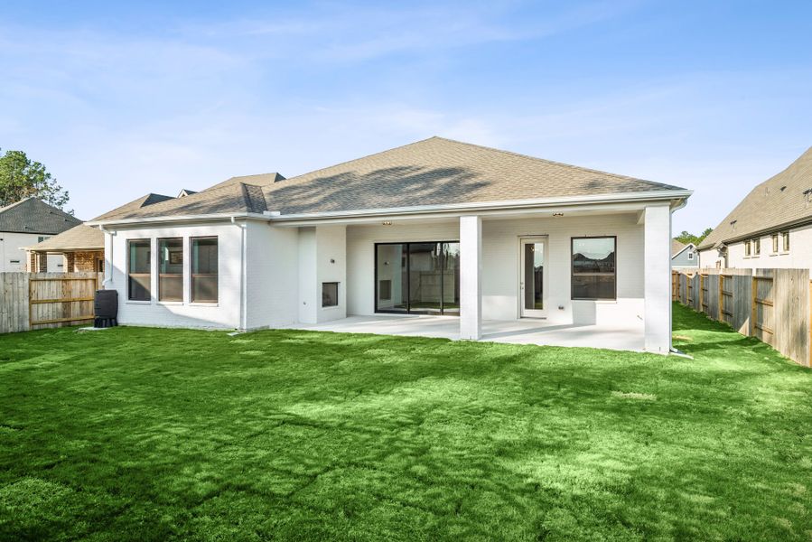 Exterior details and patio area of a home in ARTAVIA - Parkview Collection, Conroe (Image 3). Exterior details and patio area of a home in ARTAVIA - Parkview Collection, Conroe (Image 3).