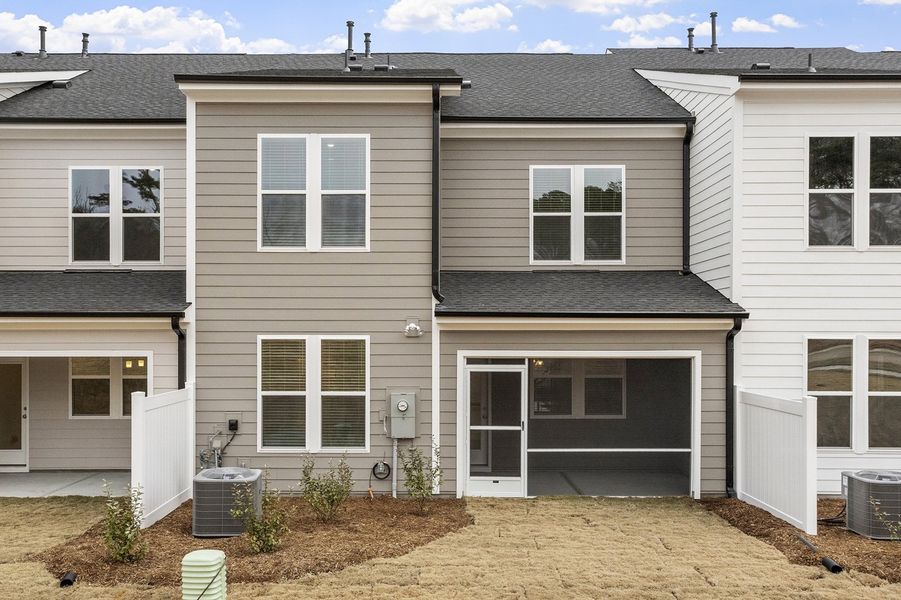 Exterior details and patio area of a home in Ovation at Sweetbrier, Durham (Image 3).