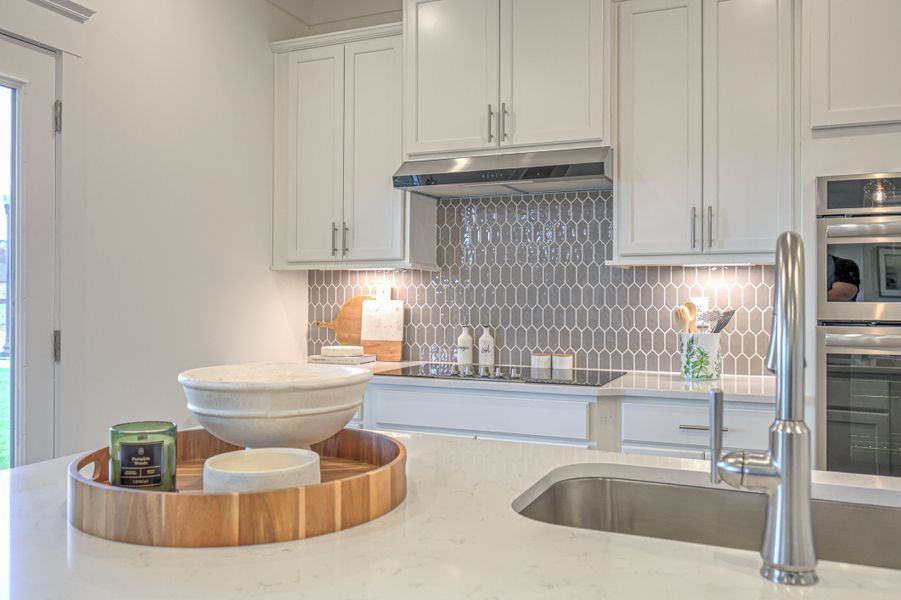 *Photo of example Model Home. Selections and finishes may vary.