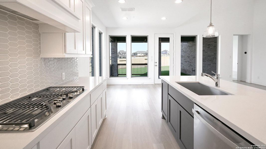 Furnished interior view inside a new home in Homestead 55', Schertz (Image 6).