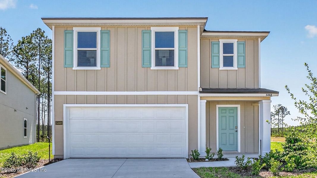 Front exterior of a new home in Copes Landing, Jacksonville, FL, highlighting curb appeal (Image 2). Front exterior of a new home in Copes Landing, Jacksonville, FL, highlighting curb appeal (Image 2).