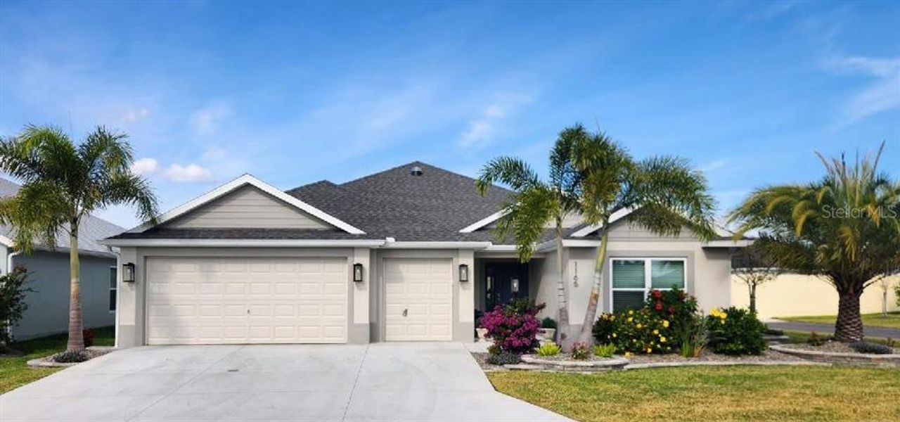 Front exterior of a new home in , The Villages, FL, highlighting curb appeal (Image 2). Front exterior of a new home in , The Villages, FL, highlighting curb appeal (Image 2).