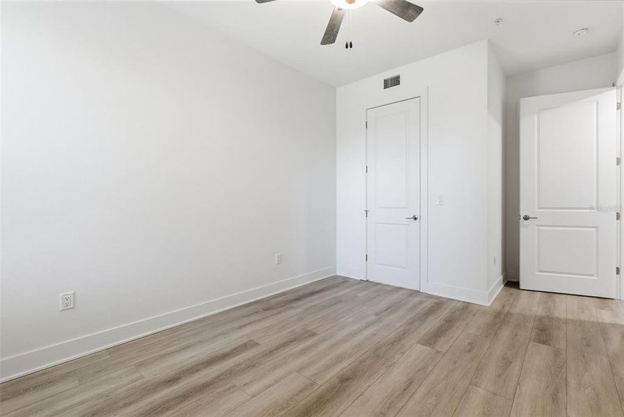 Spacious, unfurnished interior of a new home in Residences at Town Center, Madeira Beach (Image 25).