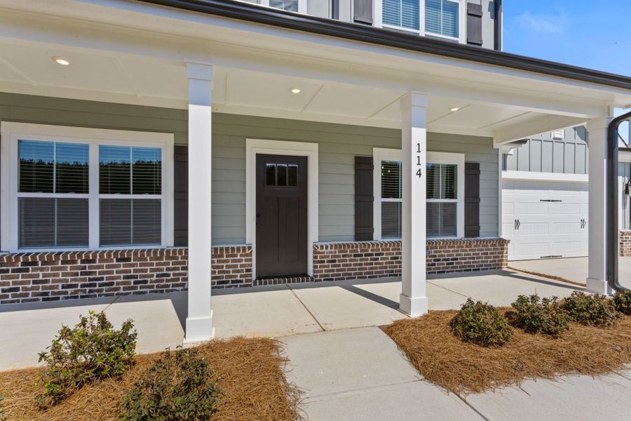 Exterior details and patio area of a home in Cherokee Knoll, Williamston (Image 3).