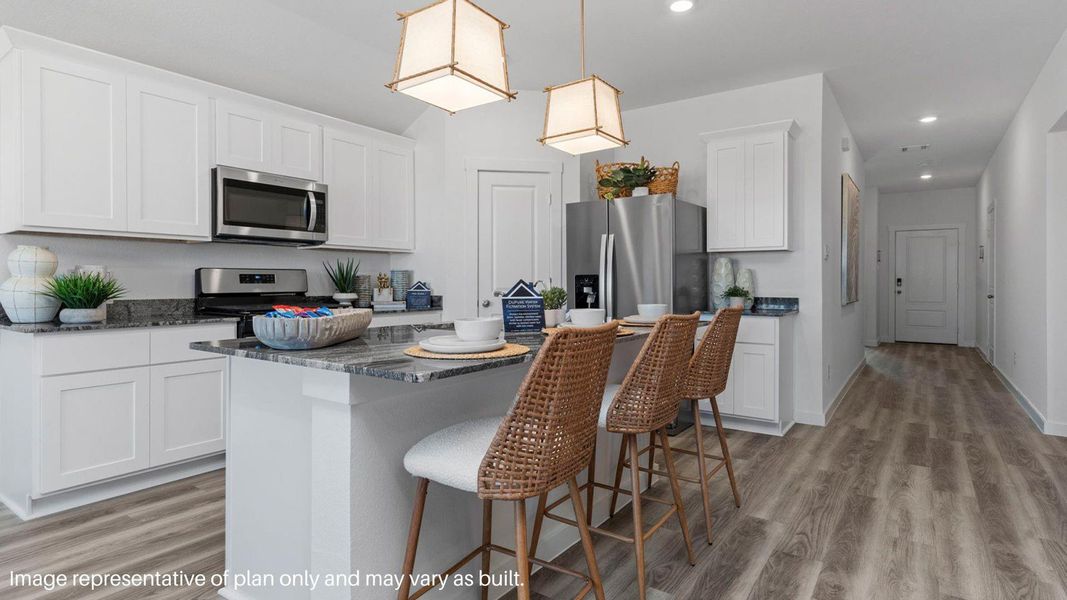 Furnished interior view inside a new home in Caldwell Crossing, Iowa Colony (Image 9).