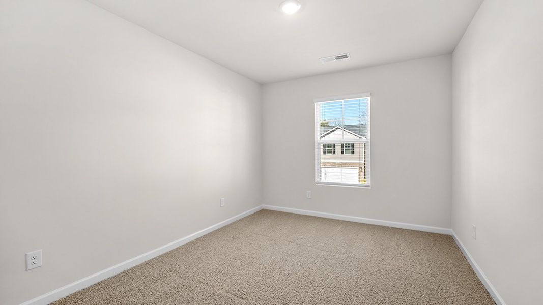 Representative unfurnished interior of a home built from the Edmon by D.R. Horton in Poplar Preserve, Newnan (Image 18).