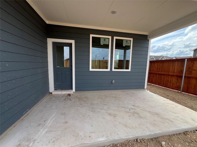 Exterior details and patio area of a home in The Homestead at Lariat, Liberty Hill (Image 12).