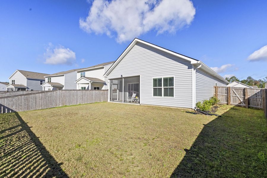 Exterior details and patio area of a home in K. Hovnanian's® Four Seasons at Lakes of Cane Bay, Summerville (Image 4). Exterior details and patio area of a home in K. Hovnanian's® Four Seasons at Lakes of Cane Bay, Summerville (Image 4).