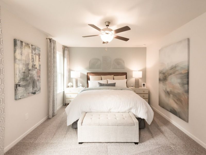 Primary bedroom in the Paisley at a Meritage Homes community in Holly Springs, GA.