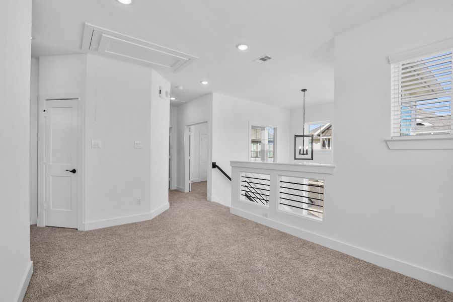 Spacious, unfurnished interior of a new home in Meridiana, Manvel (Image 18).