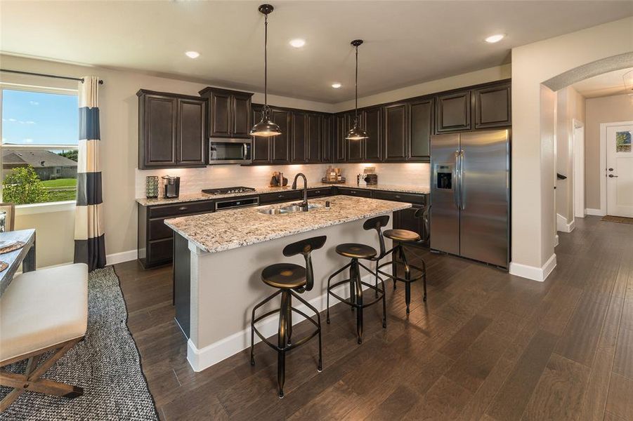 Beazer Homes Woodcreek Laredo Floorplan. This is not a photo of the actual home, but is a photo of the Laredo floorplan.