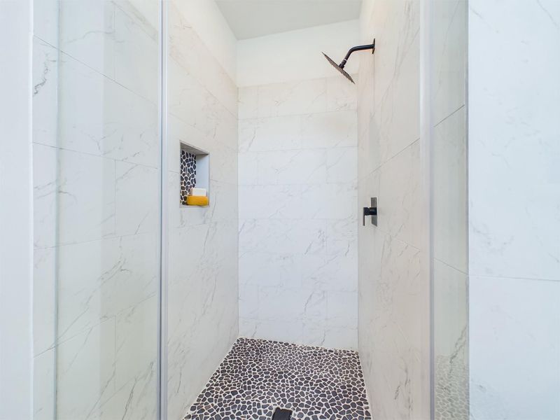 Spacious shower - primary bathroom