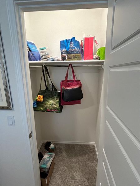 Walk in closet in secondary bedroom. Walk in closet in secondary bedroom.