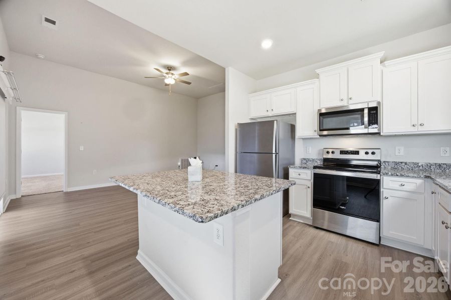Furnished interior view inside a new home in Stagecoach Station, Gastonia (Image 5).