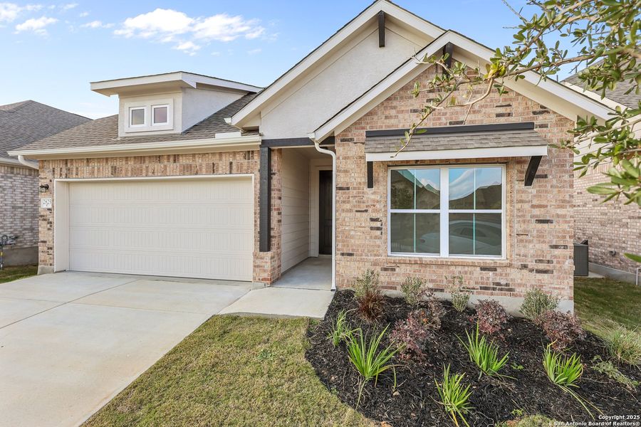 Front exterior of a new home in Sunflower Ridge, New Braunfels, TX, highlighting curb appeal (Image 22).