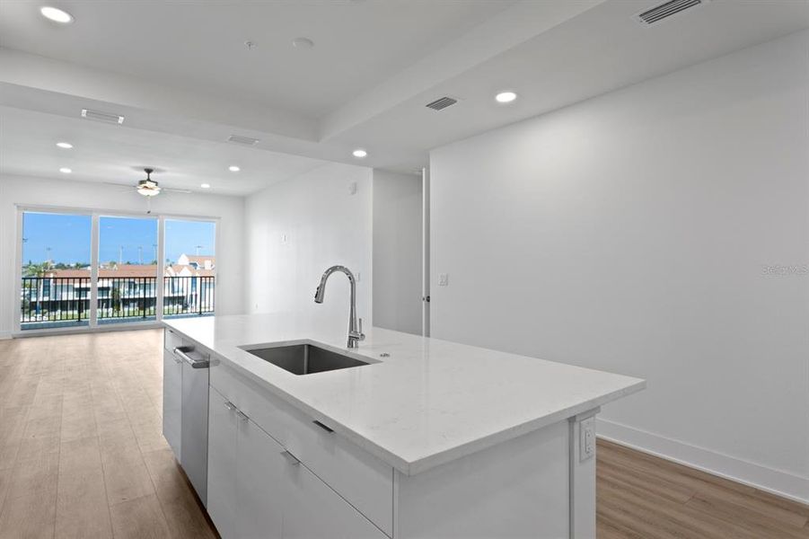 Furnished interior view inside a new home in Residences at Town Center, Madeira Beach (Image 33).