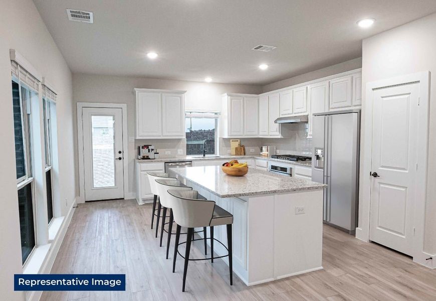 Representative furnished interior of a home built from the Ellis F by First Texas Homes in The Villages of Hurricane Creek, Anna (Image 8). Representative furnished interior of a home built from the Ellis F by First Texas Homes in The Villages of Hurricane Creek, Anna (Image 8).