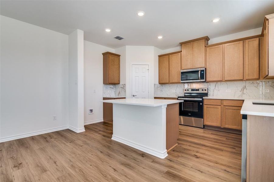Furnished interior in a model home at Cottonwood Creek in Seagoville (Image 5).