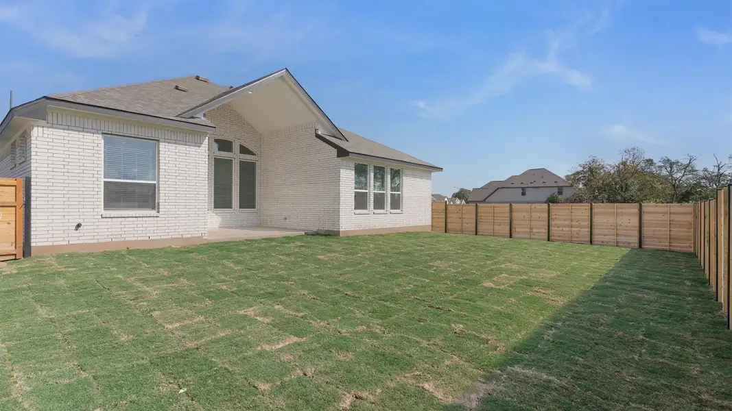 Exterior details and patio area of a home in Highland Village, Georgetown (Image 4).