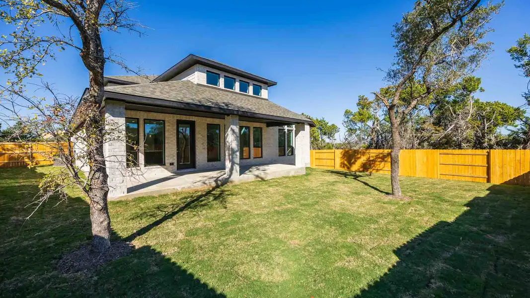 Exterior details and patio area of a home in Parkside On The River 60', Georgetown (Image 3).