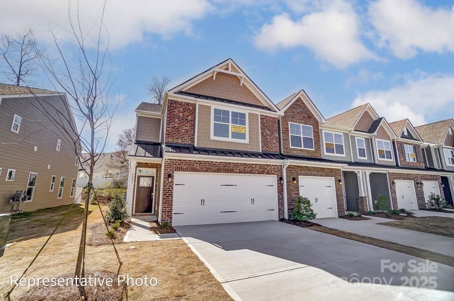 Homesite 228 features an end-unit Southampton floorplan with front load garage.