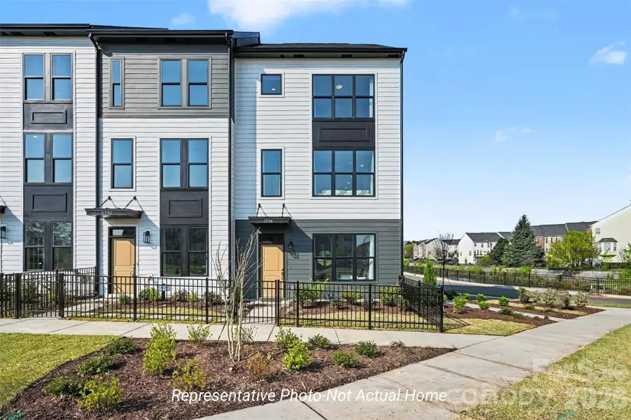 Condo located in Charlotte, NC showcasing its design and architecture (Image 3).
