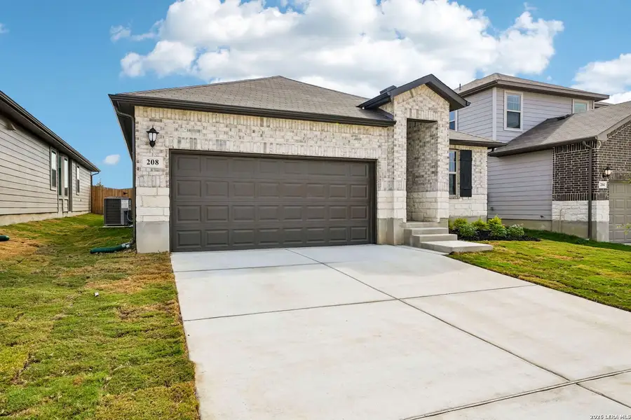 Front exterior of a new home in Legendary Trails - Premier Series, Cibolo, TX, highlighting curb appeal (Image 1). Front exterior of a new home in Legendary Trails - Premier Series, Cibolo, TX, highlighting curb appeal (Image 1).